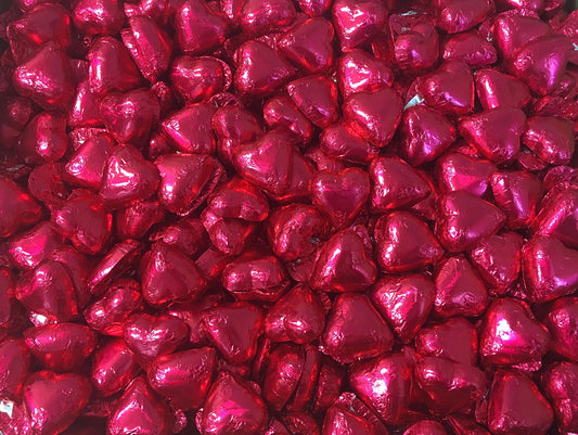 Toms Choc Hearts 1kg fuschia foiled in cello bag