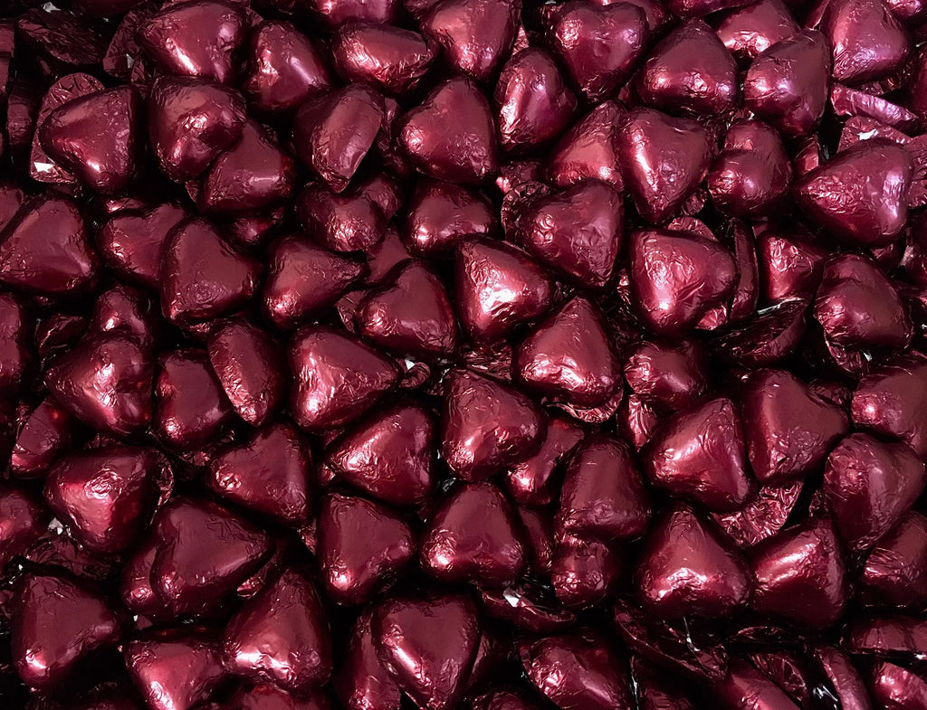 Toms Choc Hearts 1kg burgundy foiled in cello bag