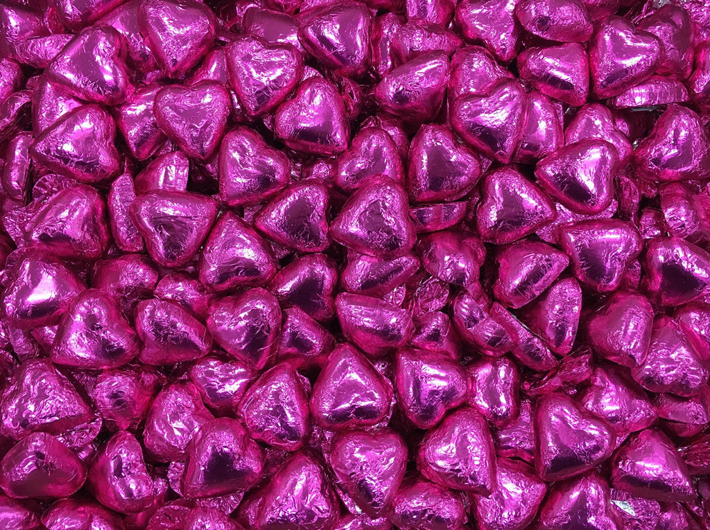 Toms Choc Hearts 1kg pink foiled in cello bag